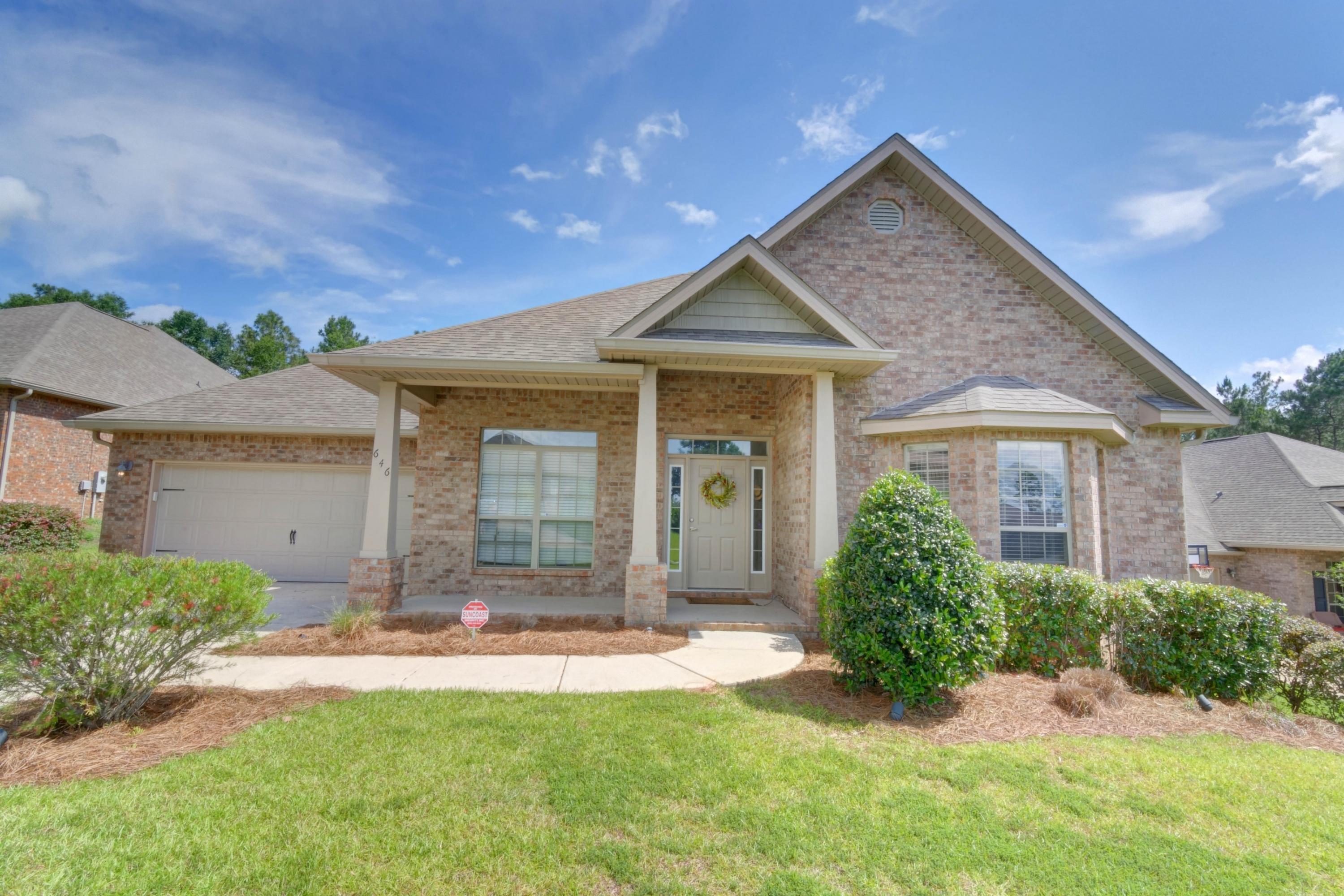 646 Red Fern Road Crestview, FL 32536 - Photo 64 of 64 a front view of a house with a yard