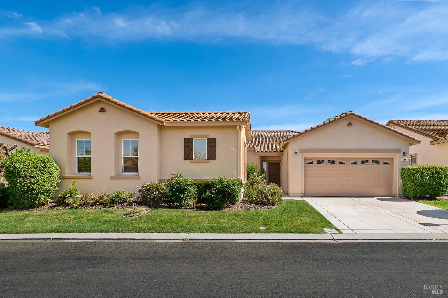 604 American Falls Drive Rio Vista, CA 94571 - Photo 1 of 39 a front view of a house with a yard