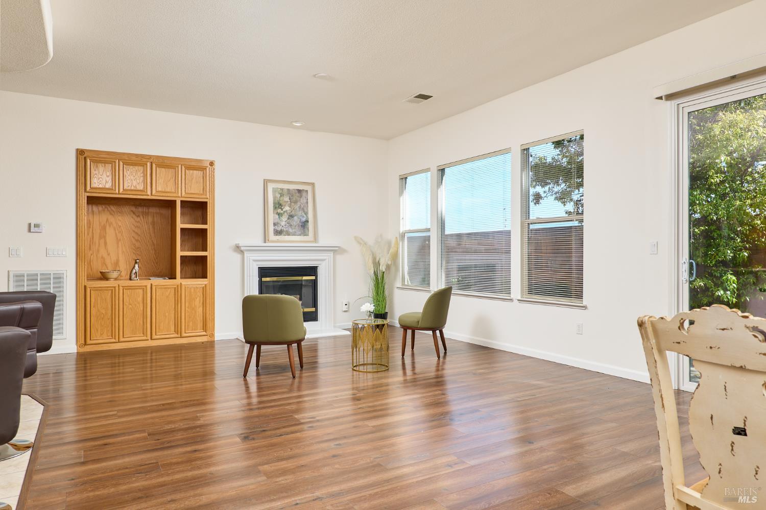 604 American Falls Drive Rio Vista, CA 94571 - Photo 10 of 39 a living room with furniture wooden floor and a fireplace
