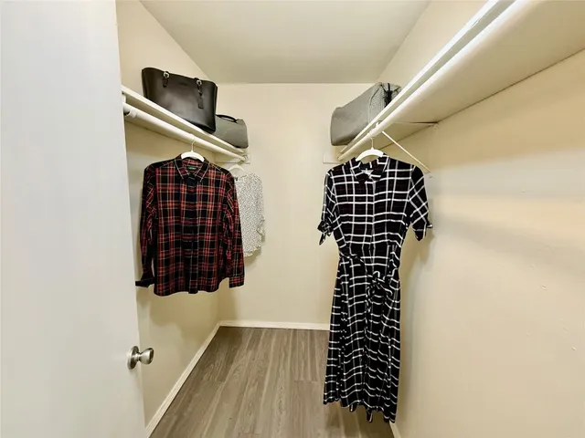 a bathroom with a vanity and a mirror