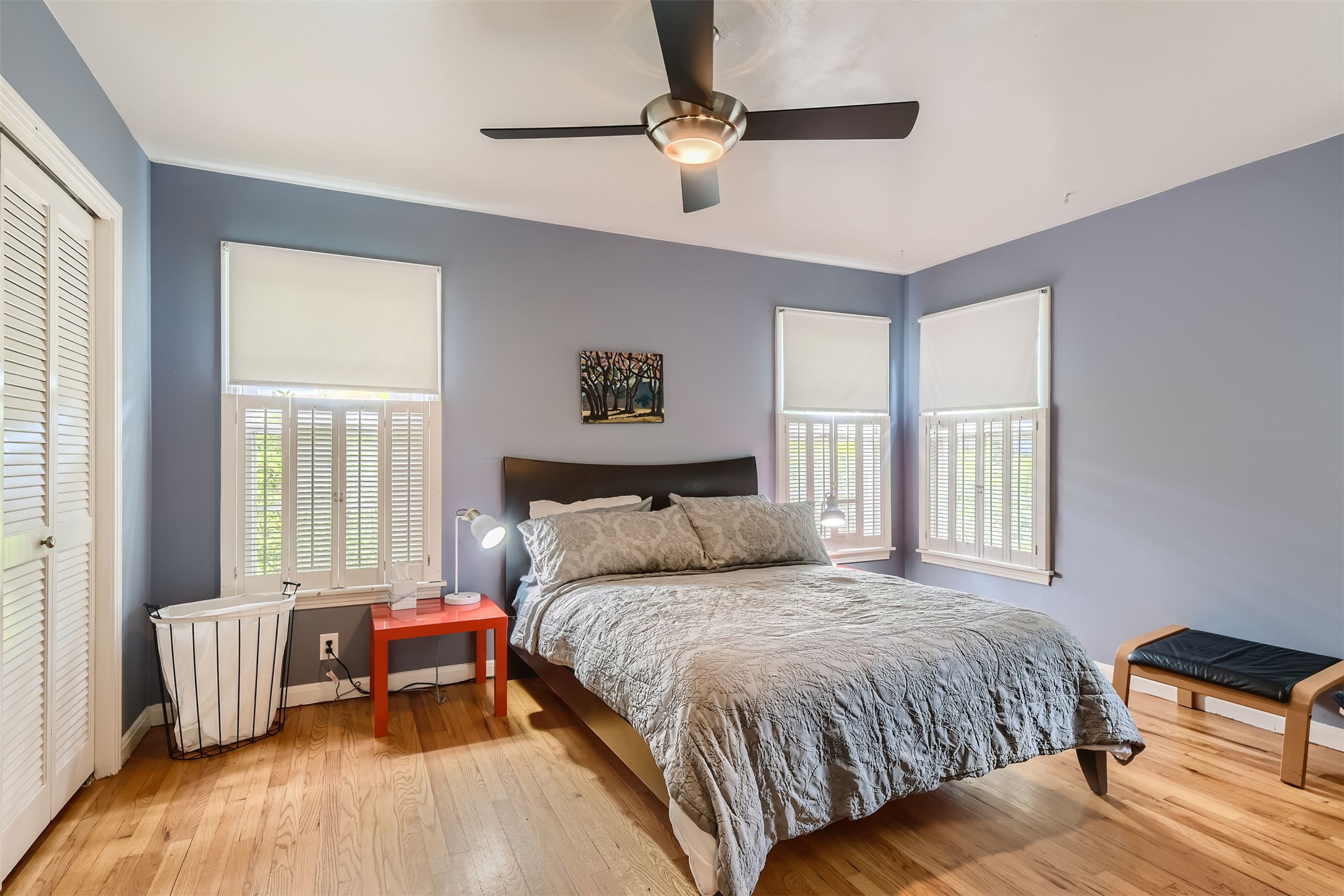 6804 Vine Street Austin, TX 78757 - Photo 7 of 15 a bedroom with a bed and a couch