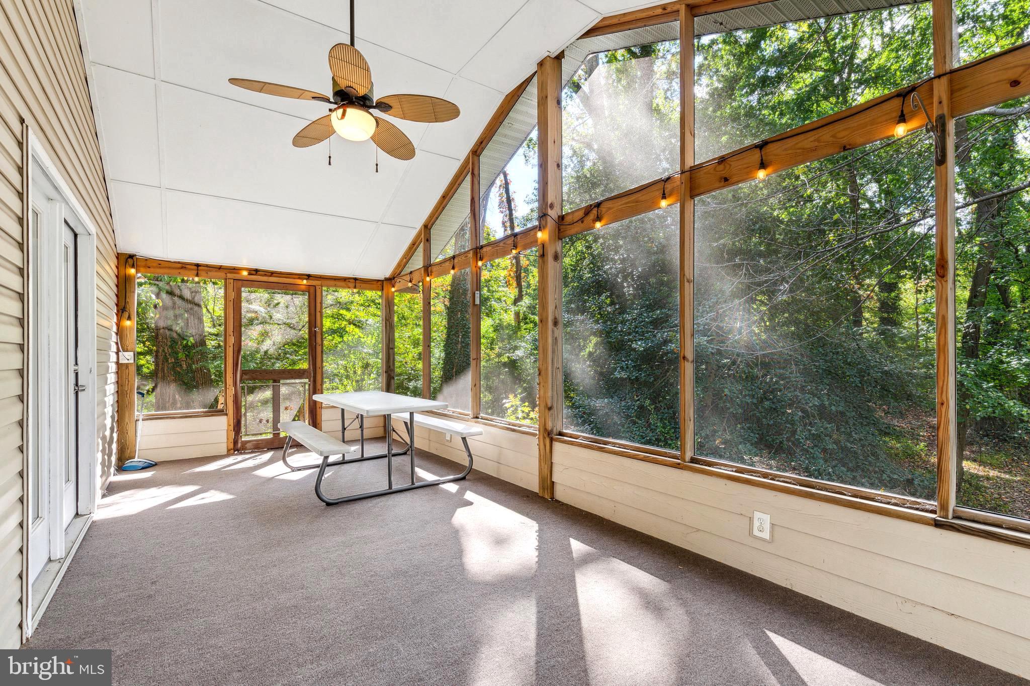 1500 St Margarets Road Annapolis, MD 21409 - Photo 17 of 18 a living room with large windows