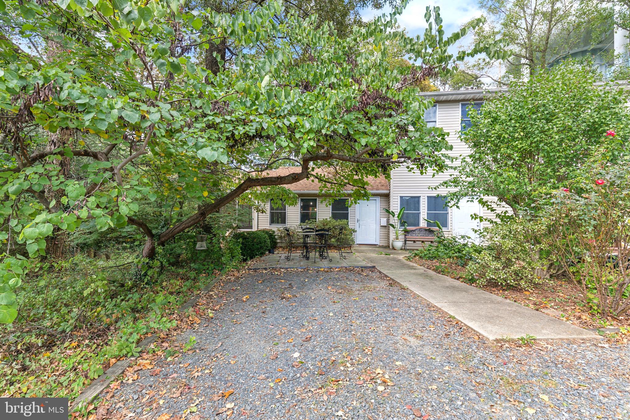 1500 St Margarets Road Annapolis, MD 21409 - Photo 18 of 18 a front view of a house with a yard and tree s