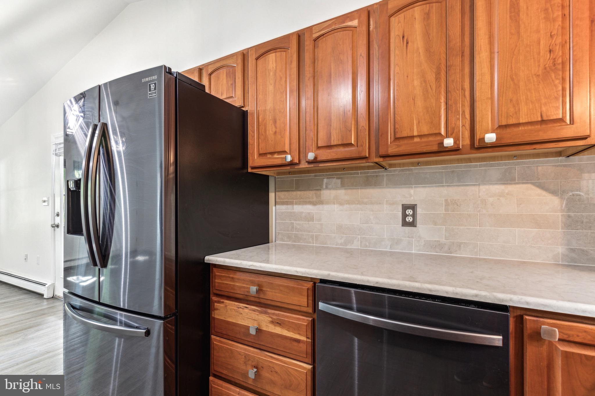 1500 St Margarets Road Annapolis, MD 21409 - Photo 3 of 18 a kitchen with stainless steel appliances granite countertop a refrigerator and a sink
