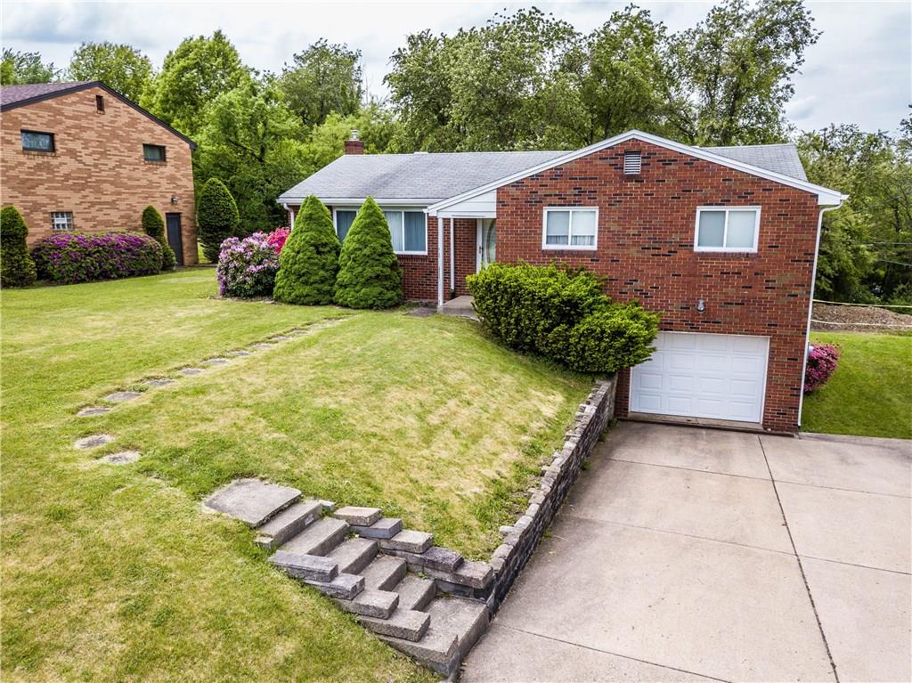 1613 Sharps Hill Road Pittsburgh, PA 15215 - Photo 22 of 22 FRONT OF HOUSE: Double wide driveway gives you that added off street parking for all your family and guests.