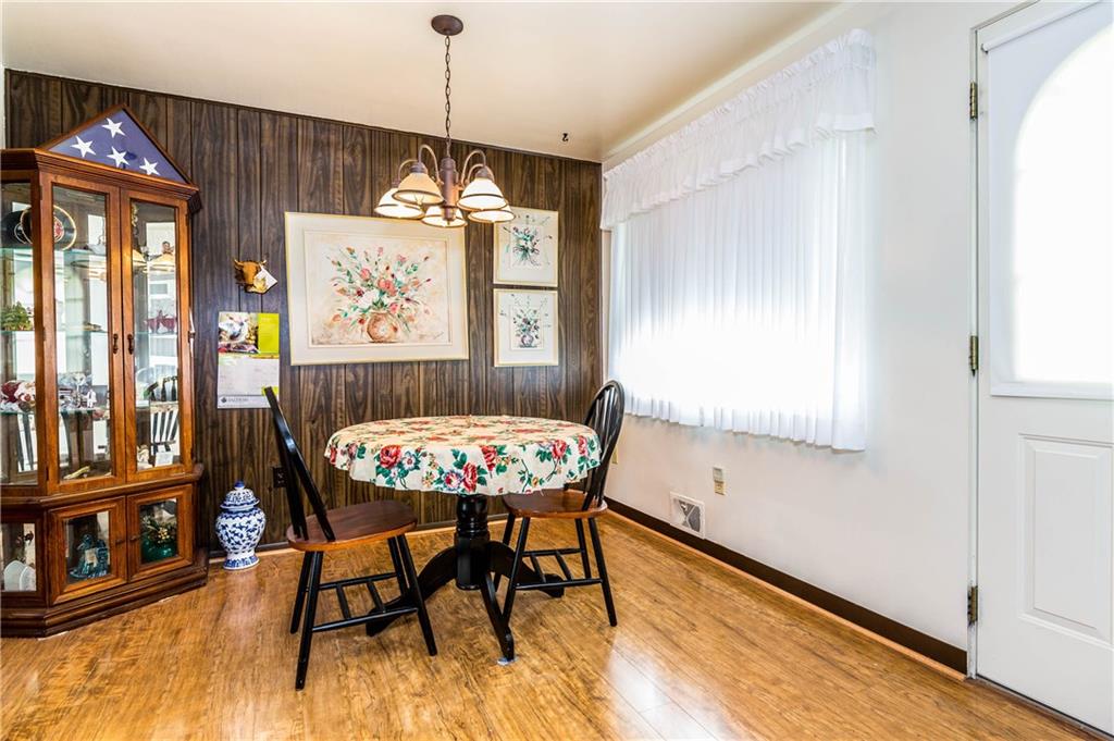1613 Sharps Hill Road Pittsburgh, PA 15215 - Photo 8 of 22 DINING ROOM 10X8: Shining new hardwood floors makes it a delight to enjoy your meals in your dining room.