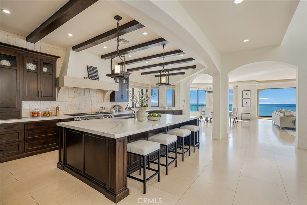 709 Esplanade Redondo Beach, CA 90277 - Photo 11 of 75 a kitchen with a sink and cabinets