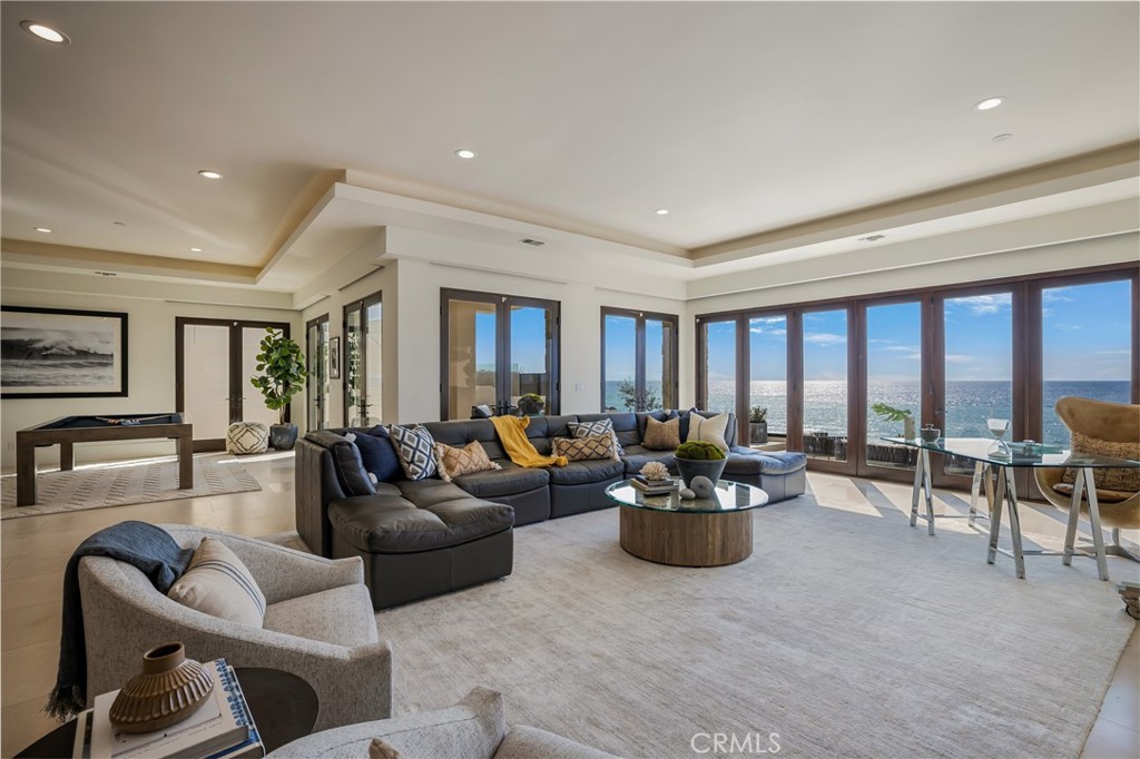709 Esplanade Redondo Beach, CA 90277 - Photo 19 of 75 a living room with furniture and a potted plant