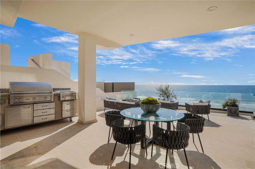 709 Esplanade Redondo Beach, CA 90277 - Photo 25 of 75 a view of a table and chairs in the patio