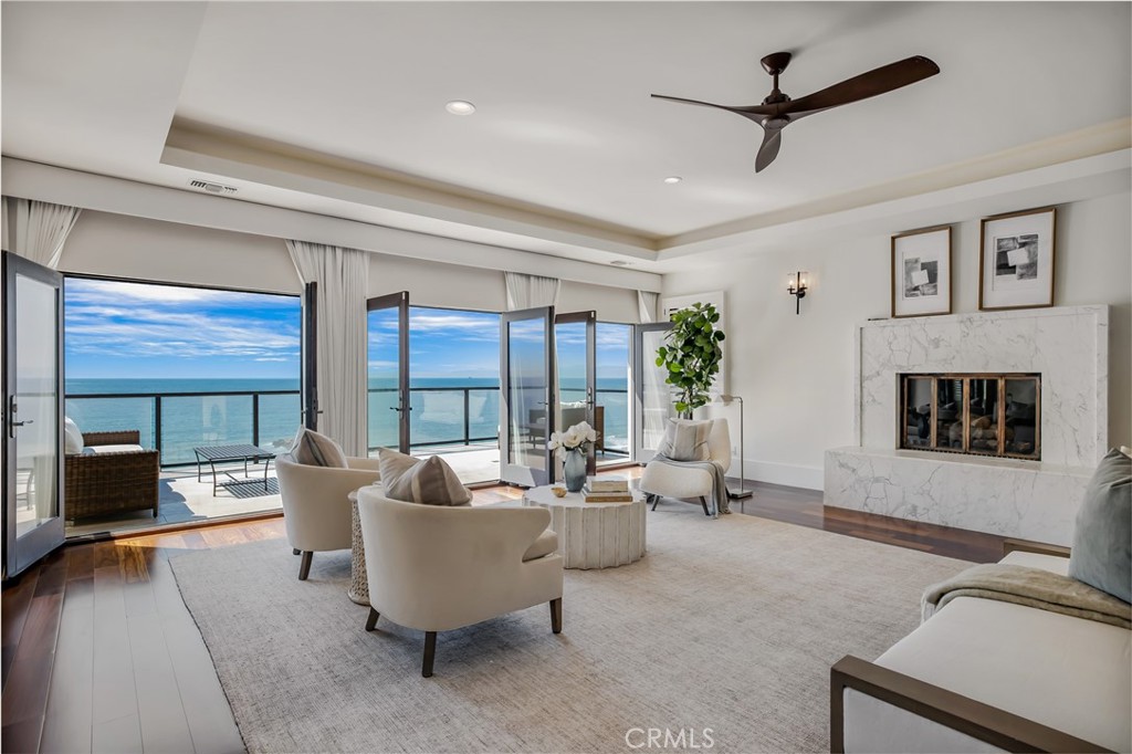 709 Esplanade Redondo Beach, CA 90277 - Photo 34 of 75 a living room with furniture and a large window