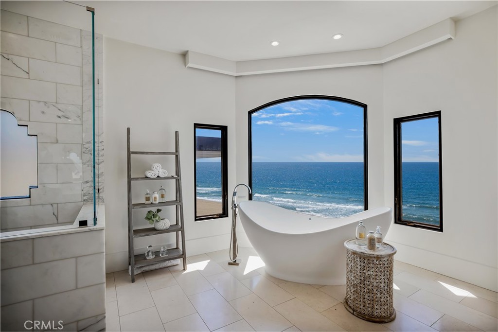 709 Esplanade Redondo Beach, CA 90277 - Photo 38 of 75 a bathroom with a tub a toilet and a shower