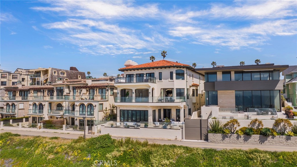 709 Esplanade Redondo Beach, CA 90277 - Photo 49 of 75 a front view of a building with lots of trees around