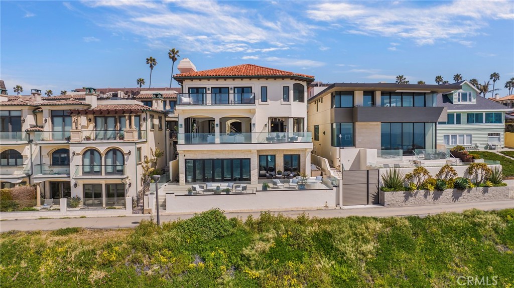 709 Esplanade Redondo Beach, CA 90277 - Photo 50 of 75 a front view of a building with balcony and seating space