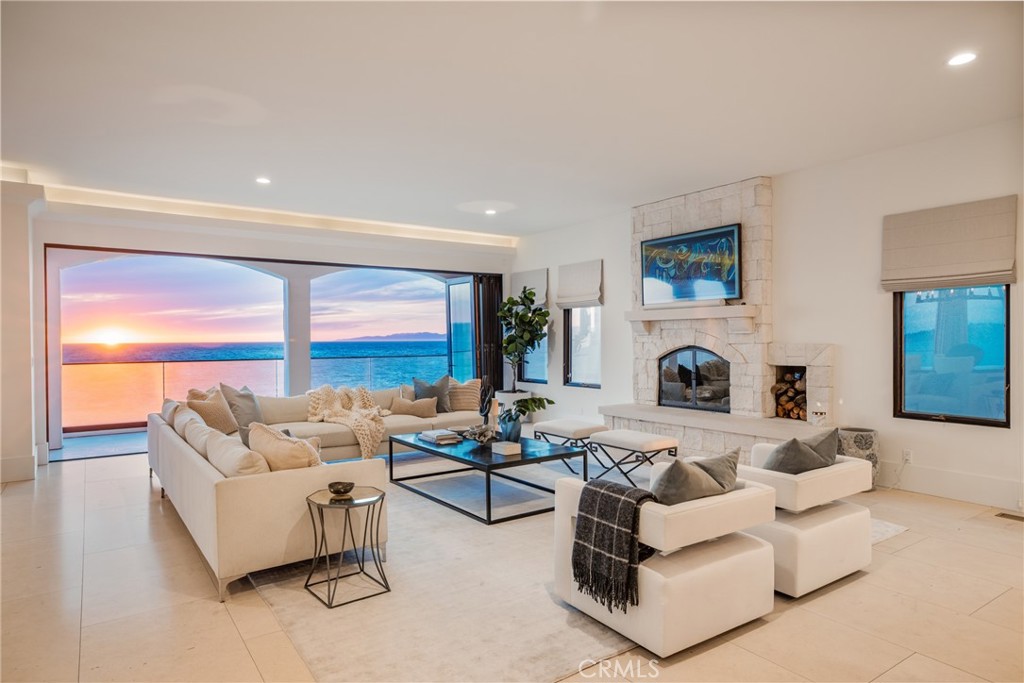 709 Esplanade Redondo Beach, CA 90277 - Photo 60 of 75 a living room with furniture and a fireplace
