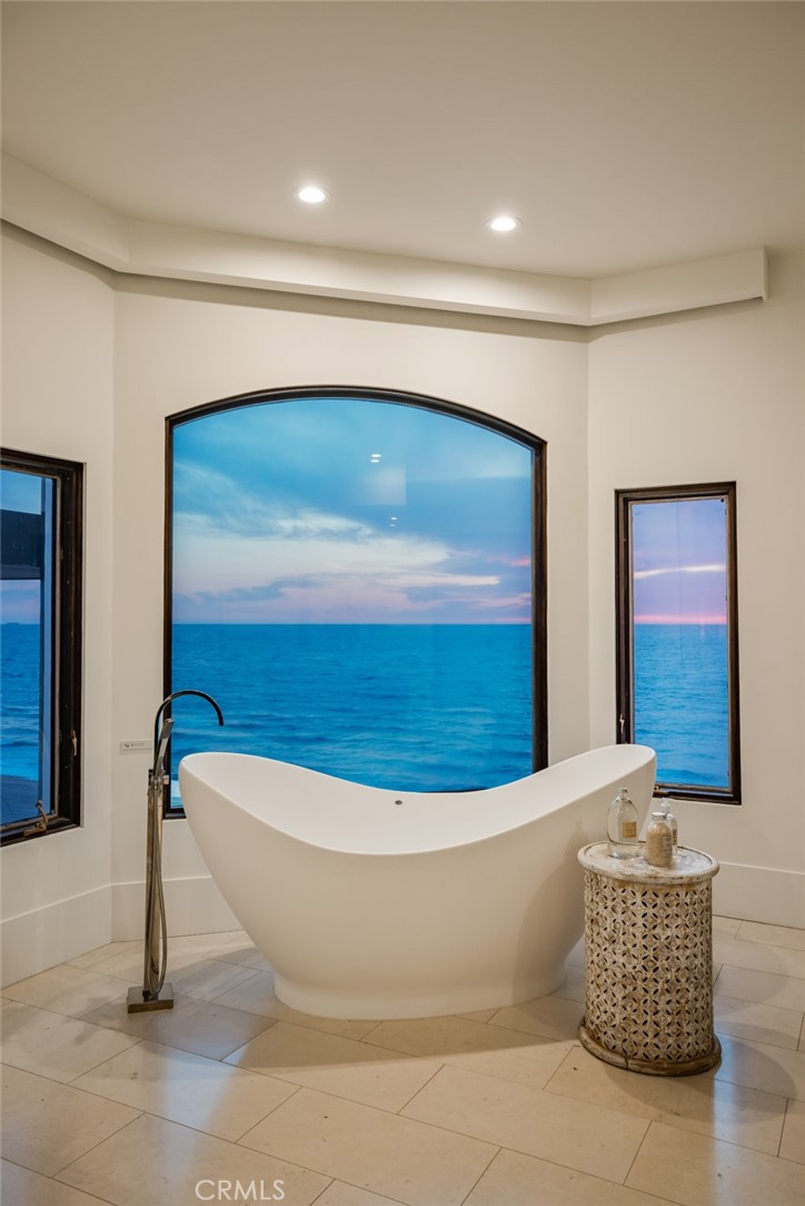 709 Esplanade Redondo Beach, CA 90277 - Photo 69 of 75 a bathroom with a bathtub and a shower