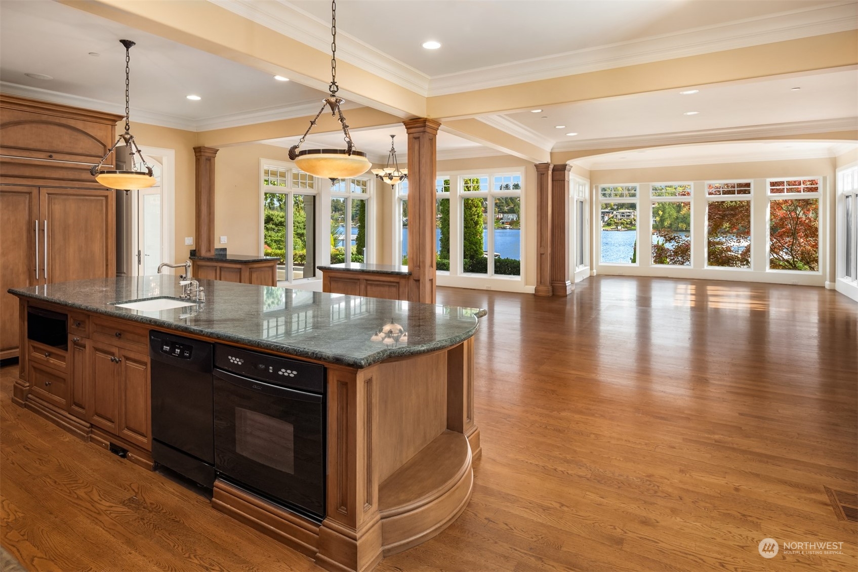 3252 Hunts Point Road Hunts Point, WA 98004 - Photo 11 of 21 a kitchen with stainless steel appliances granite countertop a stove and a wooden floors