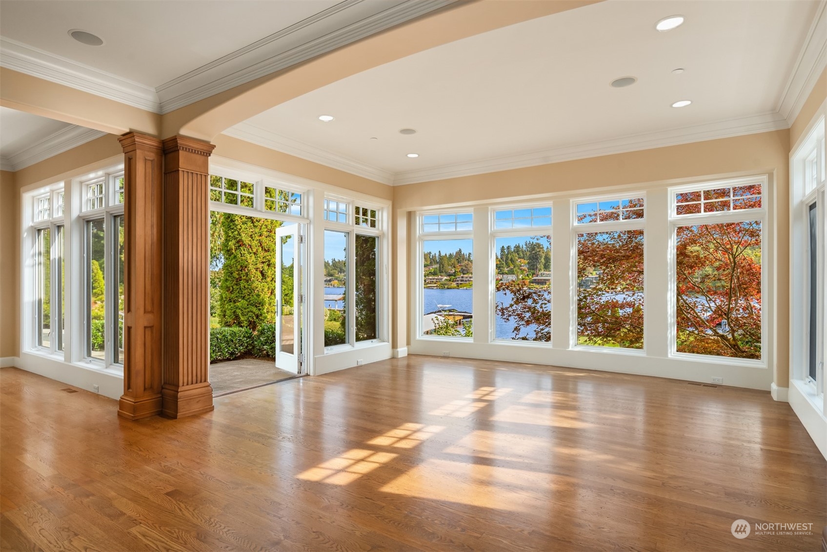 3252 Hunts Point Road Hunts Point, WA 98004 - Photo 12 of 21 a view of an entryway with wooden floor and door