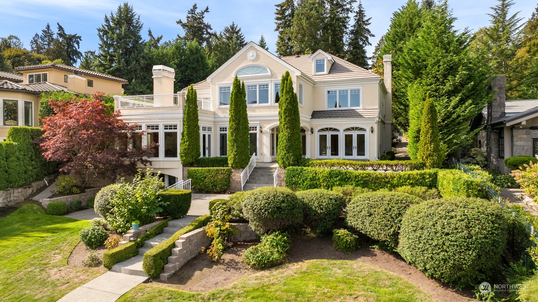 3252 Hunts Point Road Hunts Point, WA 98004 - Photo 20 of 21 front view of a house with a garden