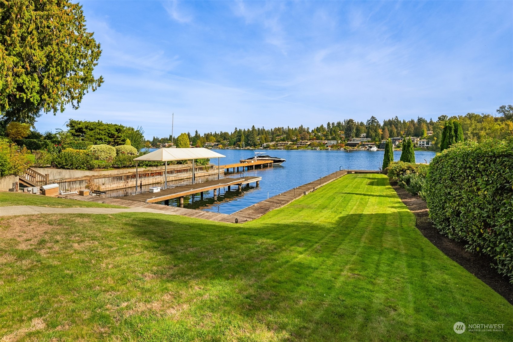 3252 Hunts Point Road Hunts Point, WA 98004 - Photo 3 of 21 a view of a swimming pool with an ocean view