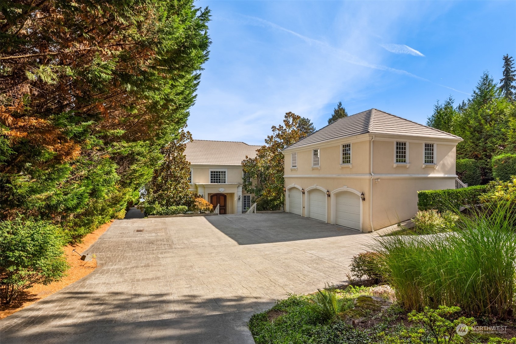 3252 Hunts Point Road Hunts Point, WA 98004 - Photo 4 of 21 a view of a house with a yard
