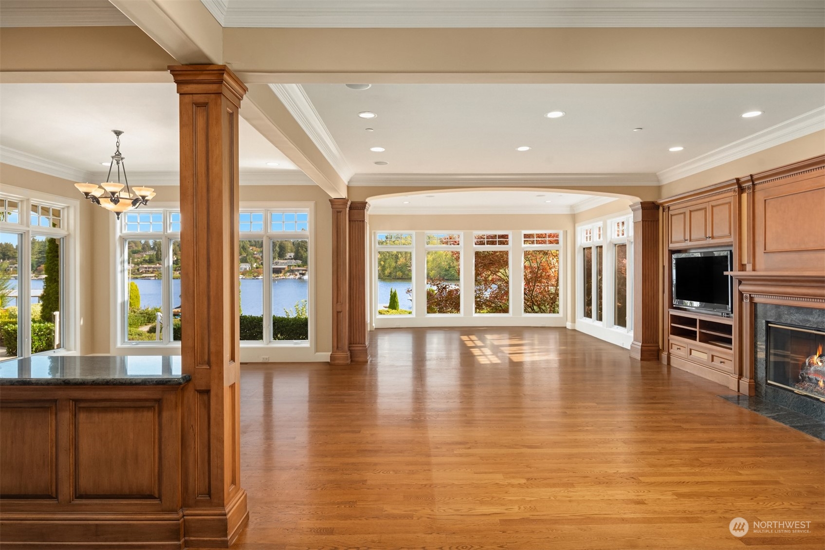 3252 Hunts Point Road Hunts Point, WA 98004 - Photo 8 of 21 a view of an entryway with wooden floor and windows