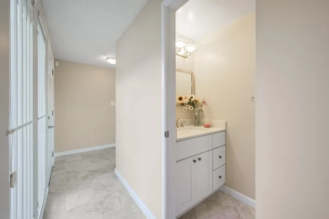 a view of a glass door and a window