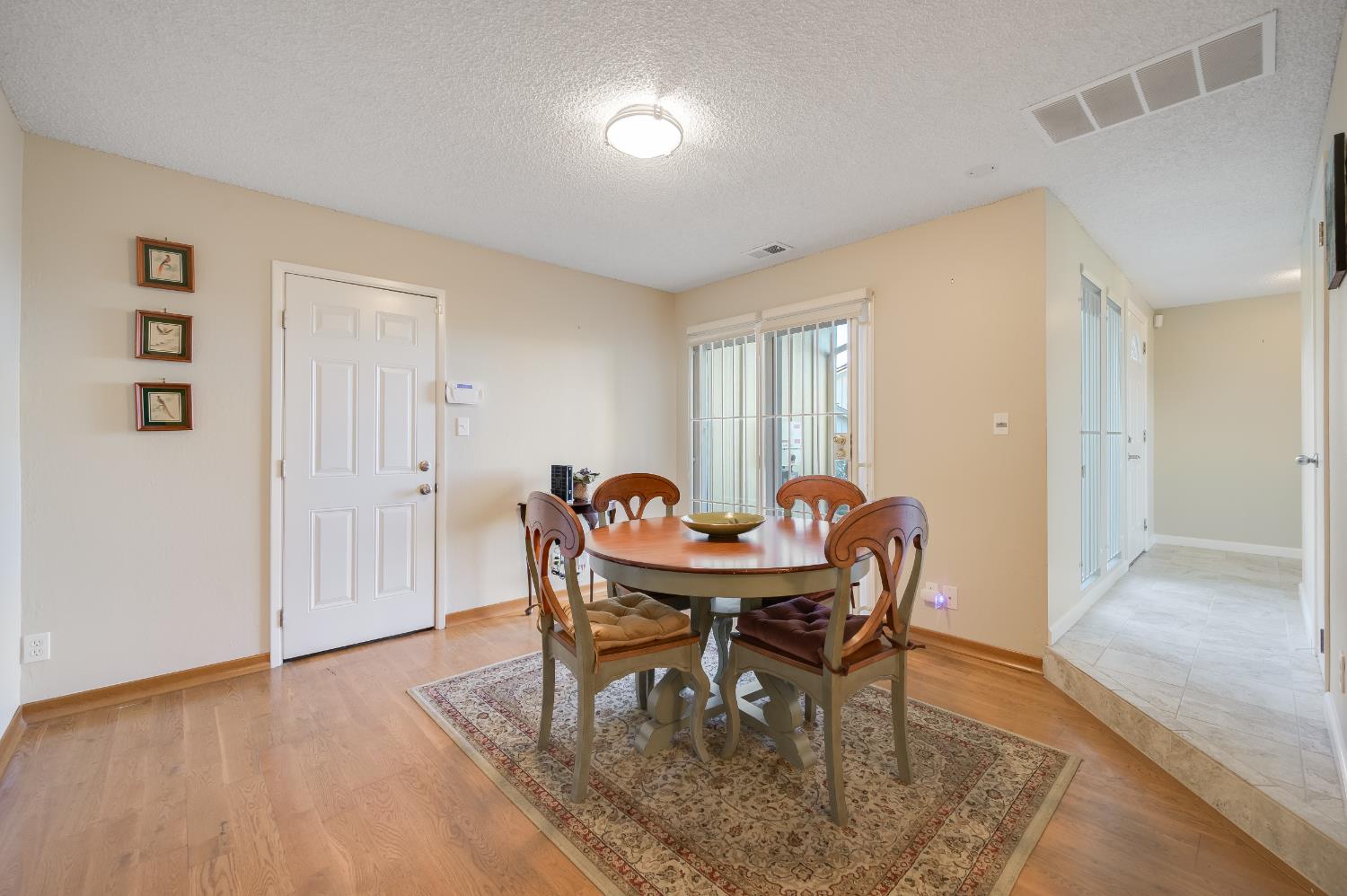 39 Quail Hill Lane El Sobrante, CA 94803 - Photo 34 of 82 a view of a dining room with furniture and a window