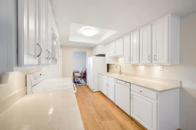 a view of city and mountain from a balcony