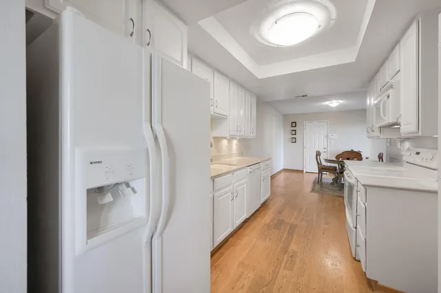 an aerial view of a city with lots of residential buildings