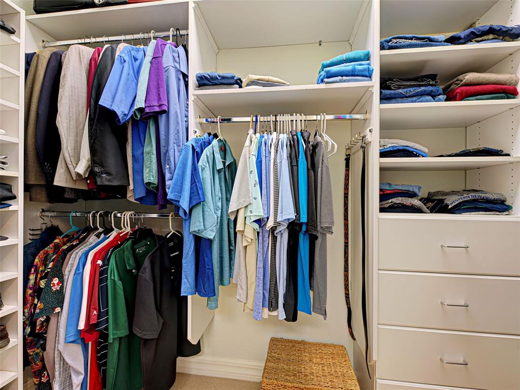 431 Tremingham Way Venice, FL 34293 - Photo 37 of 66 a view of walk in closet with clothes and shoes