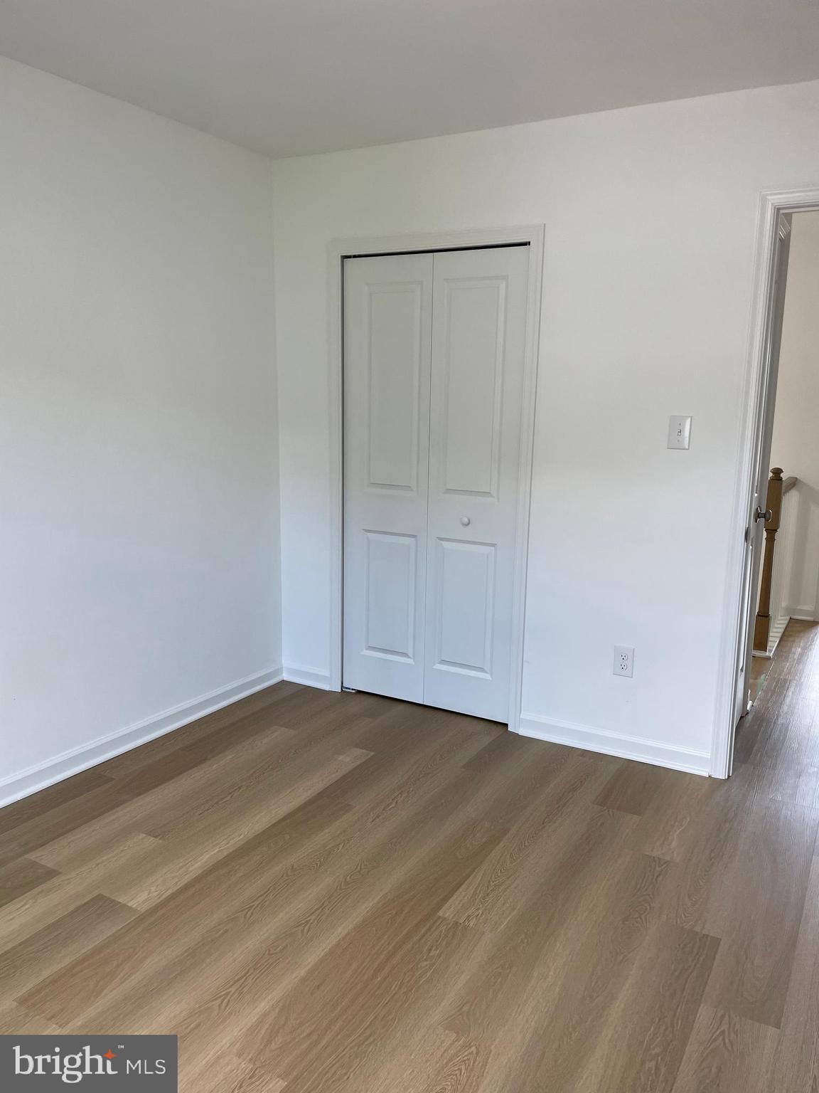 22 Winstead Drive Westampton, NJ 08060 - Photo 29 of 35 a view of an empty room with wooden floor and a window