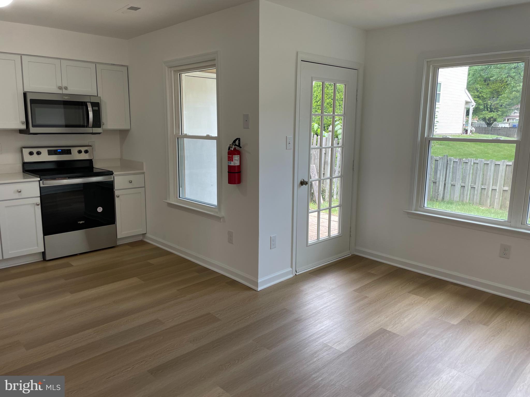 22 Winstead Drive Westampton, NJ 08060 - Photo 8 of 35 a kitchen with granite countertop wooden floors and wide window