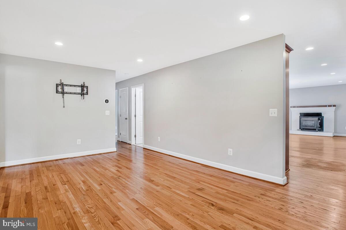 1533 Wakefield Road Edgewater, MD 21037 - Photo 18 of 41 wooden floor in an empty room with a window