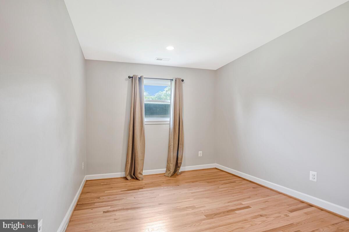 1533 Wakefield Road Edgewater, MD 21037 - Photo 20 of 41 wooden floor in an empty room