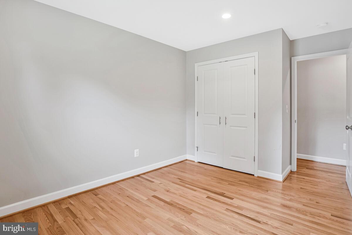 1533 Wakefield Road Edgewater, MD 21037 - Photo 21 of 41 a view of an empty room with wooden floor
