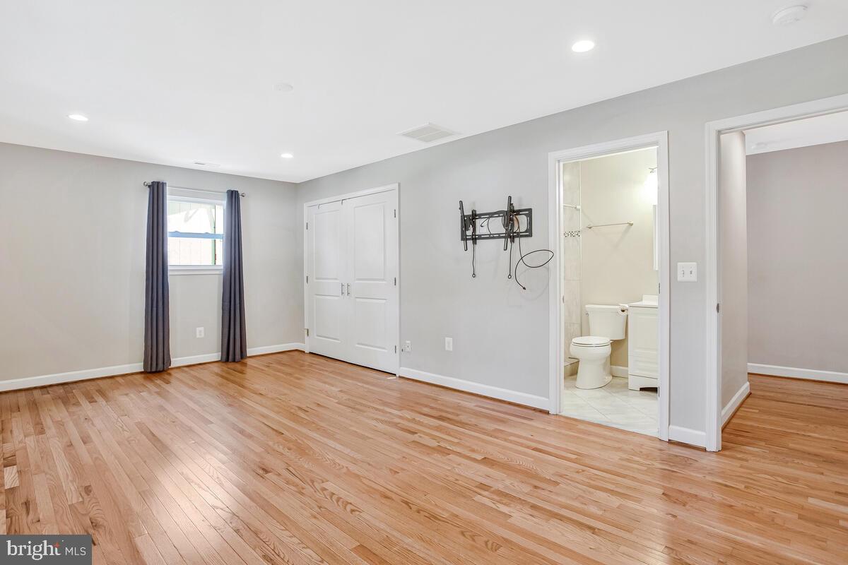 1533 Wakefield Road Edgewater, MD 21037 - Photo 31 of 41 wooden floor in an empty room with a window