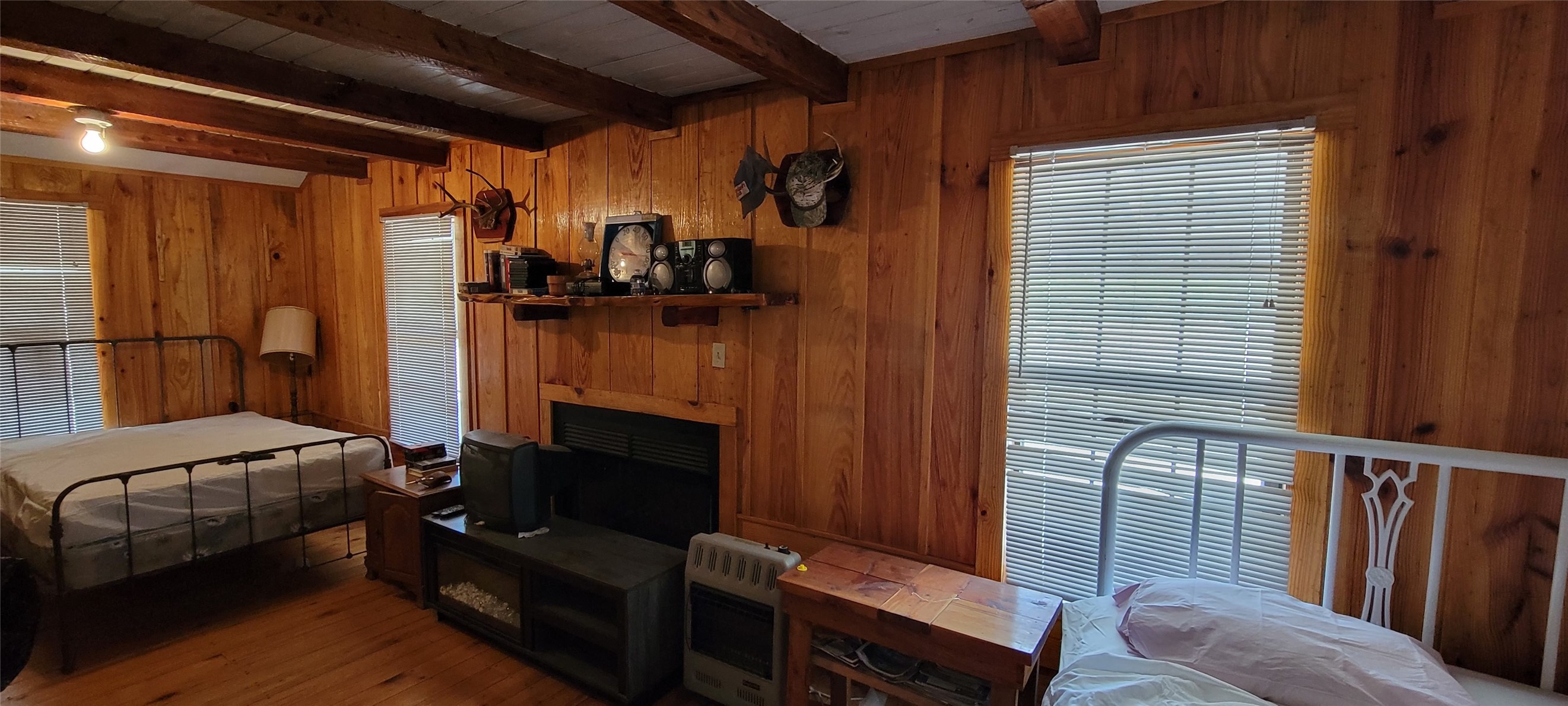 989 Cedar Ridge Road Junction, TX 76849 - Photo 44 of 50 a living room with furniture and a fireplace