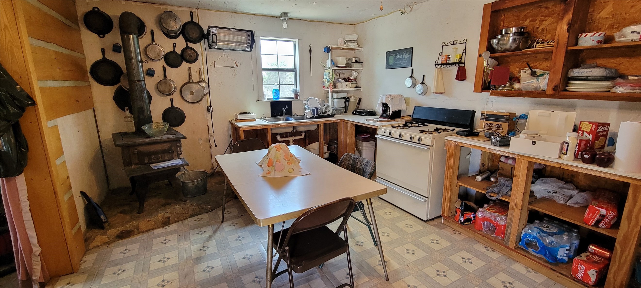 989 Cedar Ridge Road Junction, TX 76849 - Photo 45 of 50 a room with furniture a rug and a window