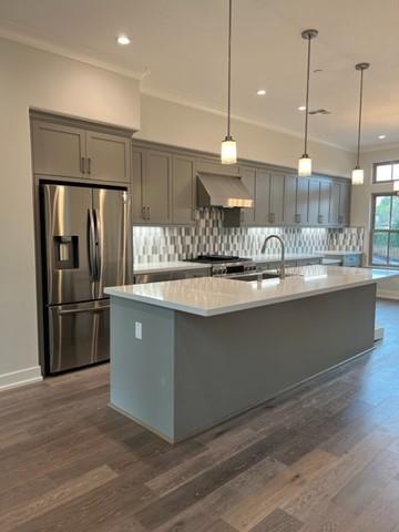 2018 West Middlefield Road Mountain View, CA 94043 - Photo 3 of 16 a kitchen with stainless steel appliances granite countertop a sink a refrigerator and a wooden floor
