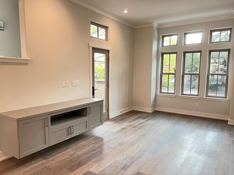 2018 West Middlefield Road Mountain View, CA 94043 - Photo 8 of 16 an empty room with wooden floor and windows