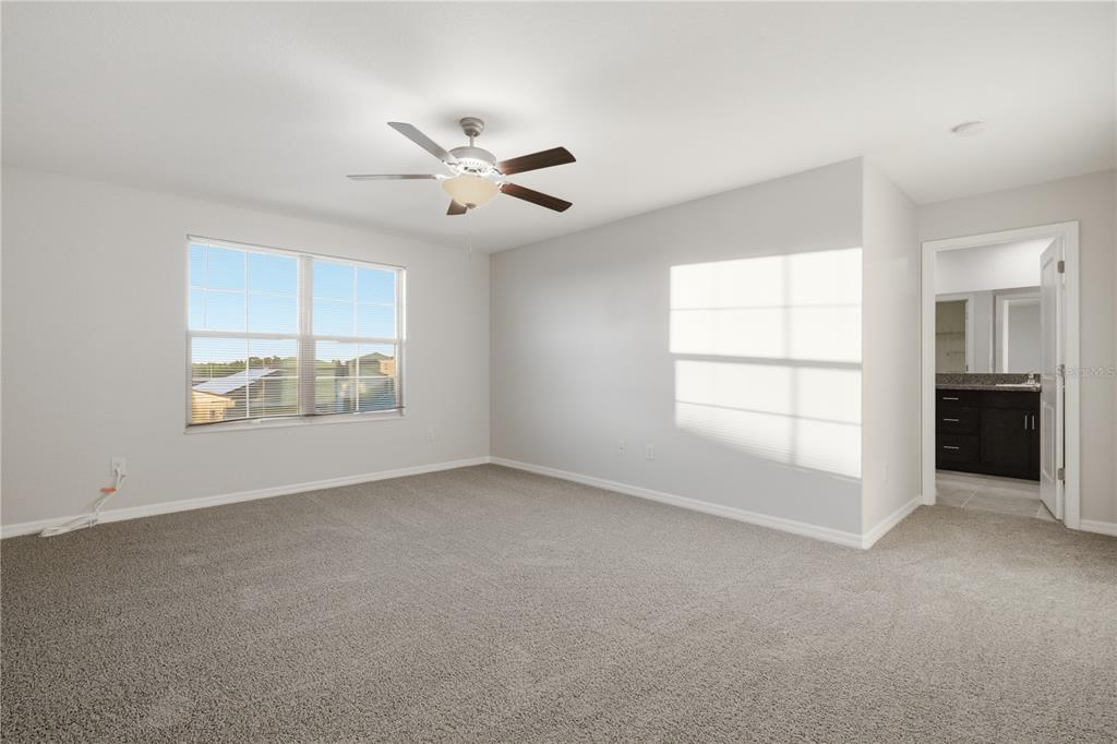 5223 Dandelion Street Apollo Beach, FL 33572 - Photo 14 of 19 a view of an empty room with a window