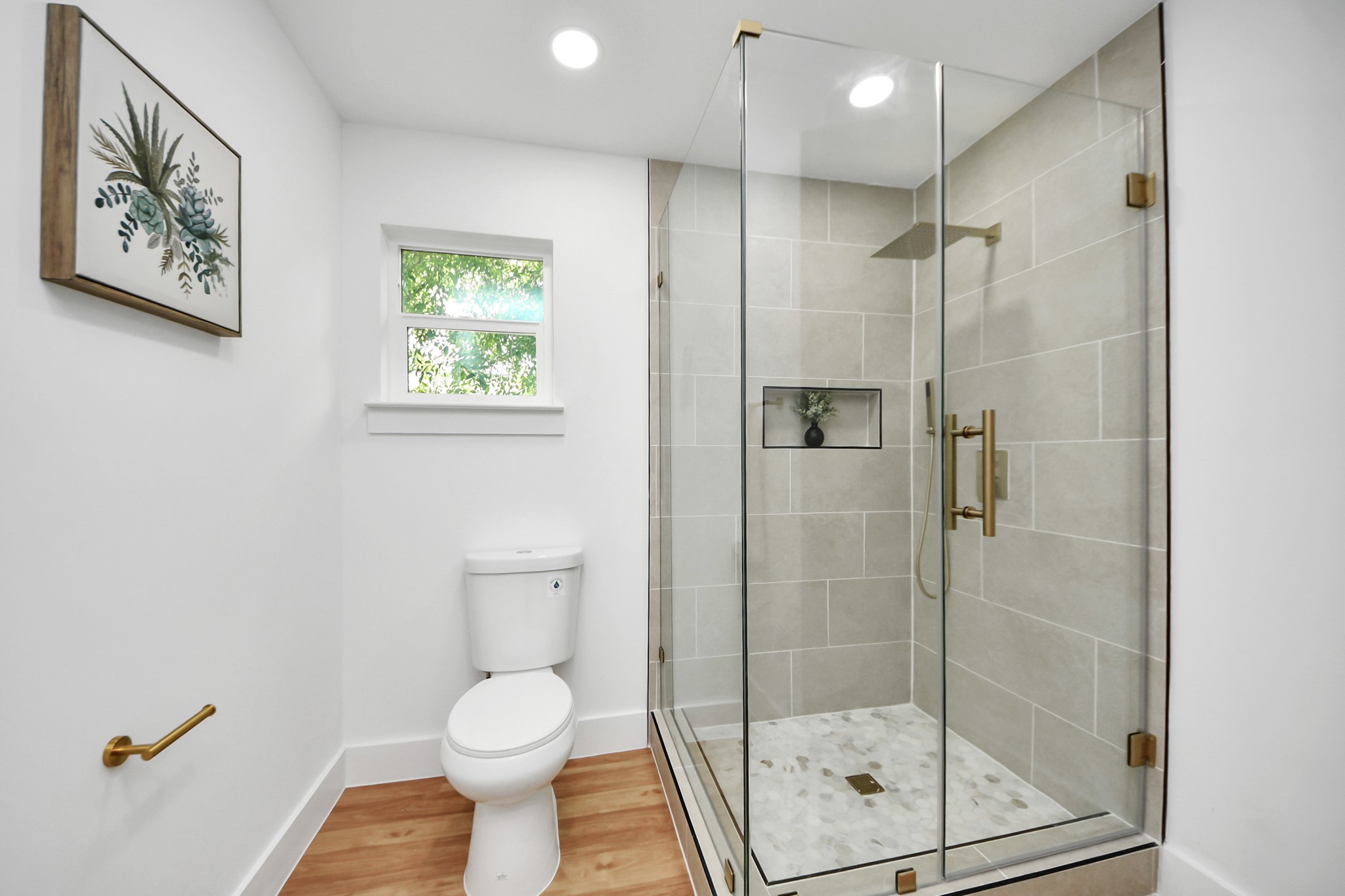 6249 Locke Lane Houston, TX 77057 - Photo 36 of 47 a bathroom with a toilet and a shower