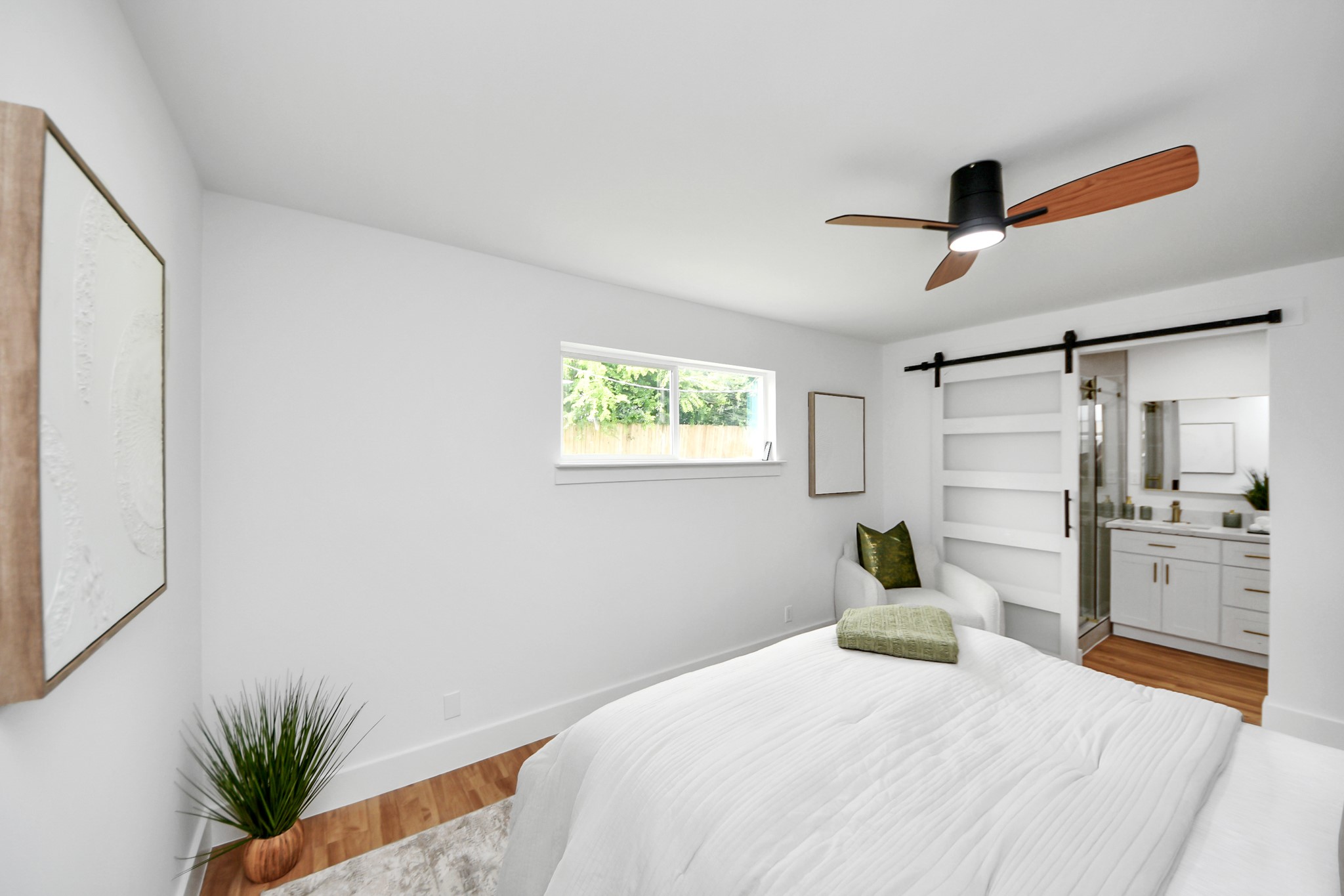 6249 Locke Lane Houston, TX 77057 - Photo 42 of 47 a bedroom with a bed and a large mirror
