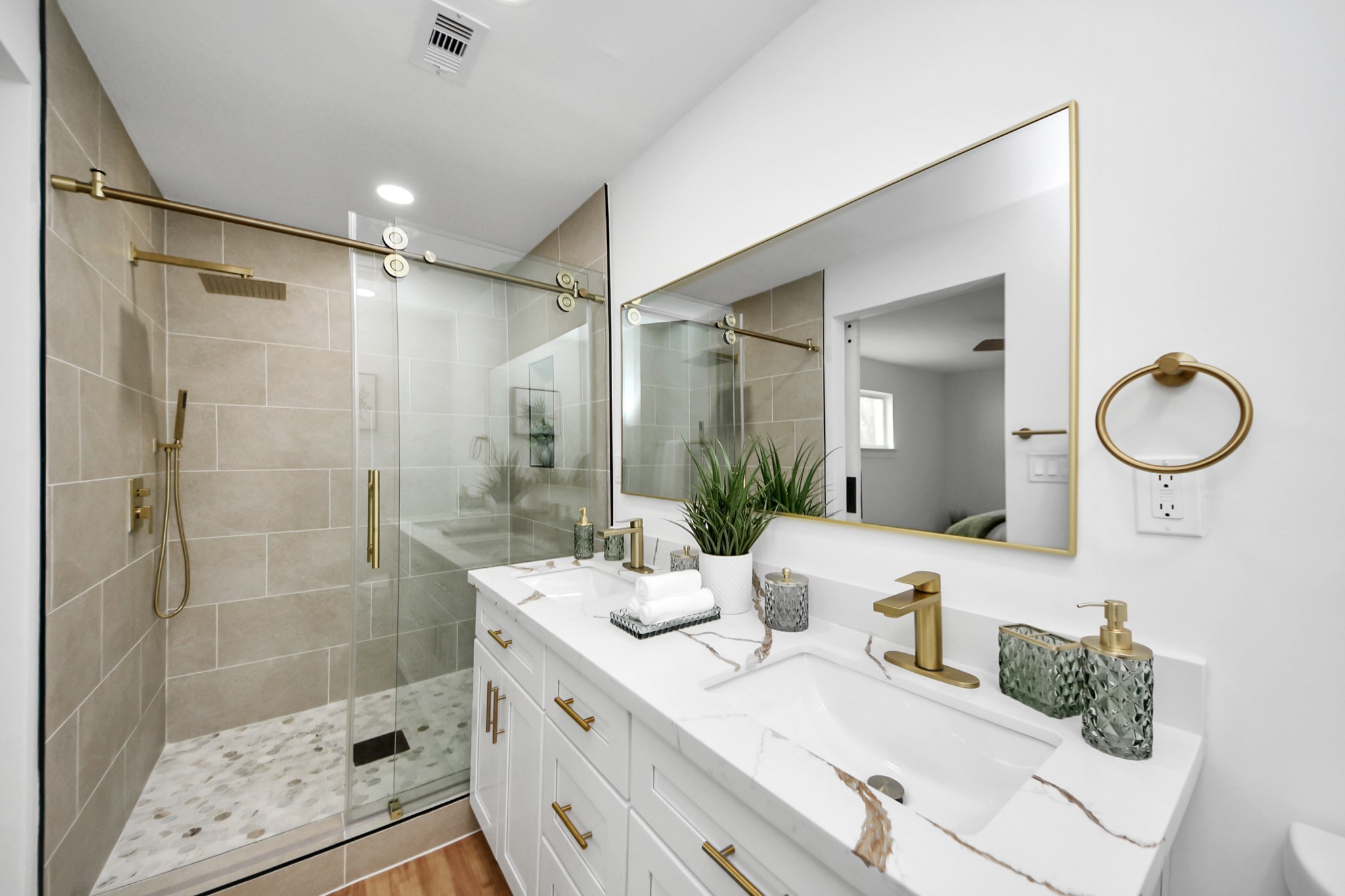 6249 Locke Lane Houston, TX 77057 - Photo 47 of 47 a bathroom with a granite countertop sink mirror and shower