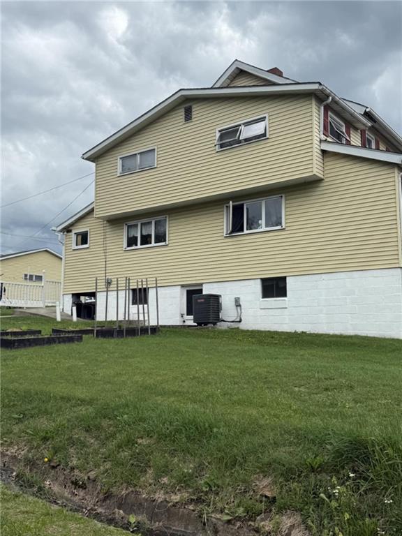 48 2nd Street Dunbar, PA 15431 - Photo 4 of 6 a front view of a house with a yard