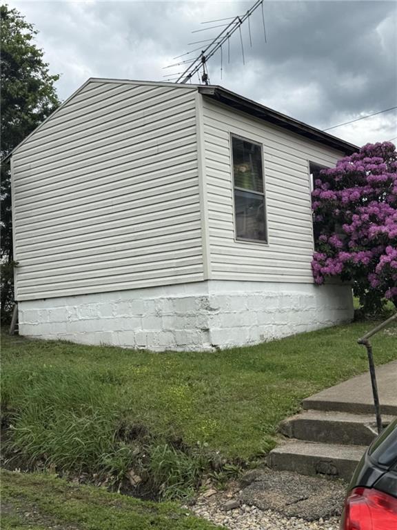 48 2nd Street Dunbar, PA 15431 - Photo 5 of 6 a front view of a house with a yard