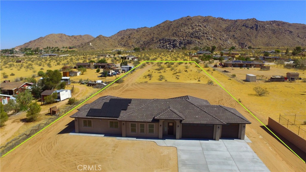24236 Cahuilla Road Apple Valley, CA 92307 - Photo 48 of 48 a view of houses with a lake