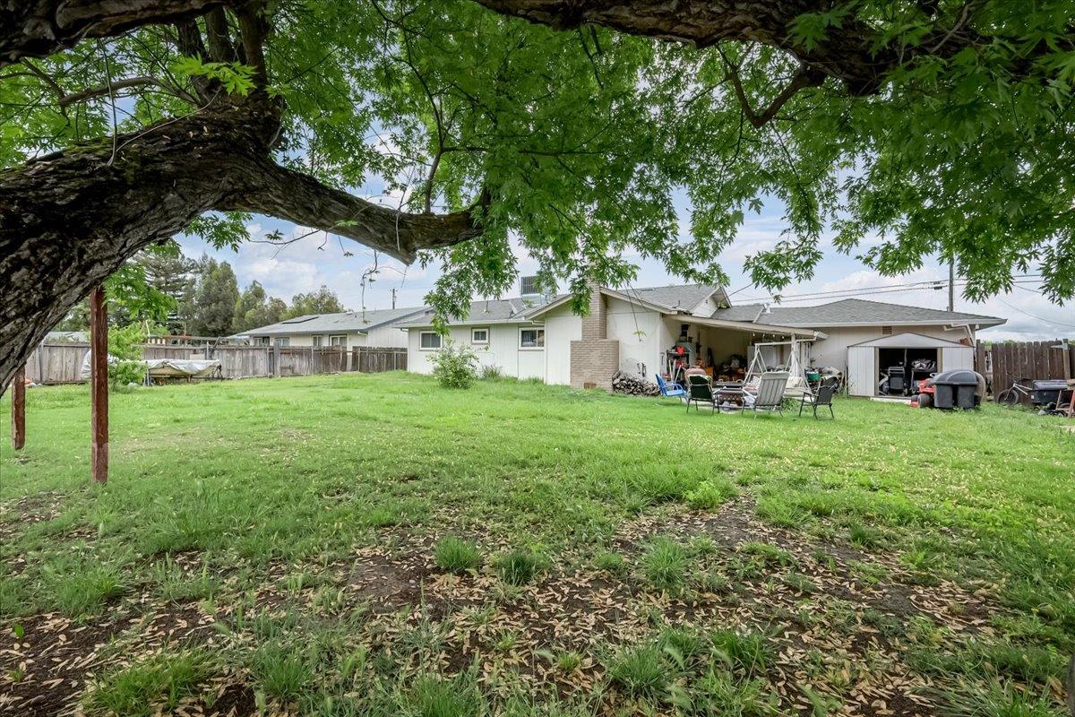 1650 North Township Road Yuba City, CA 95993 - Photo 20 of 27 a front view of a house with yard and green space