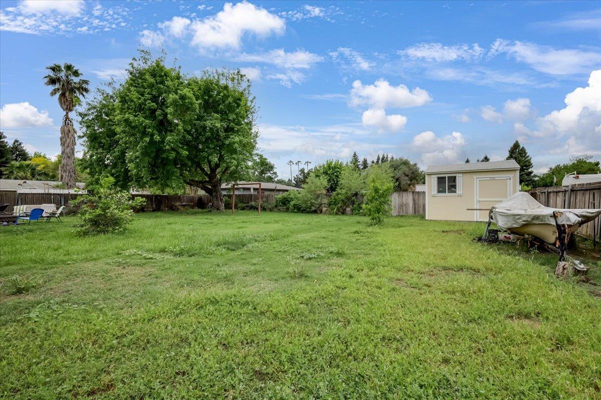 1650 North Township Road Yuba City, CA 95993 - Photo 23 of 27 a view of a house with a backyard