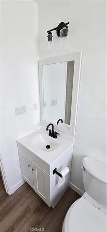 a bathroom with a sink and a toilet